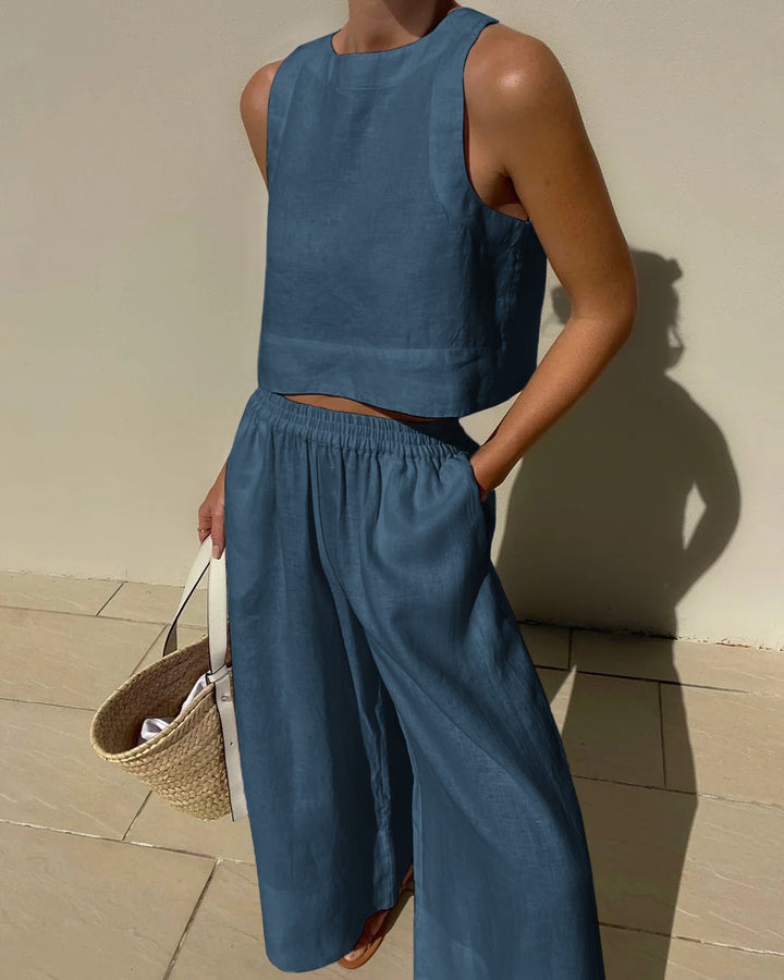 Sleeveless crop top and wide-leg trousers