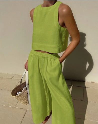 Sleeveless crop top and wide-leg trousers