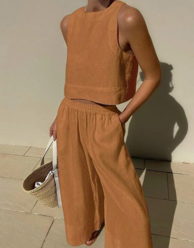 Sleeveless crop top and wide-leg trousers