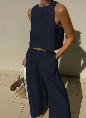 Sleeveless crop top and wide-leg trousers