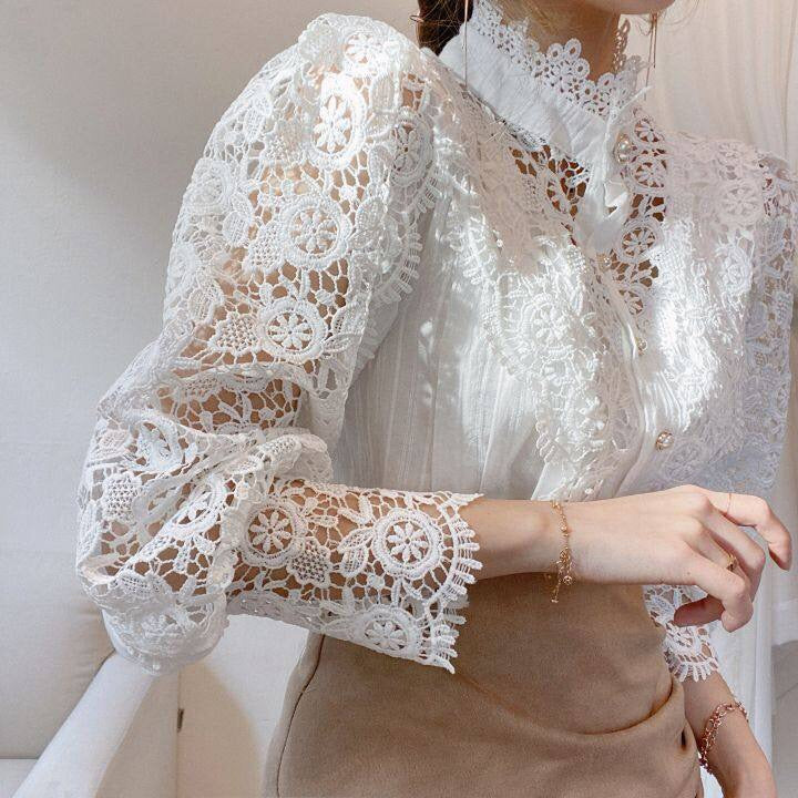 Elegant lace-embroidered tunic blouse