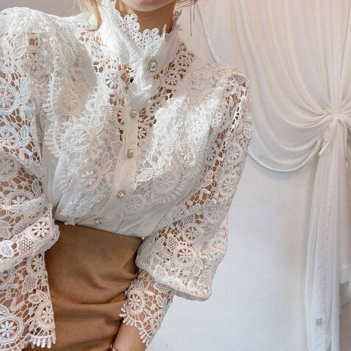 Elegant lace-embroidered tunic blouse