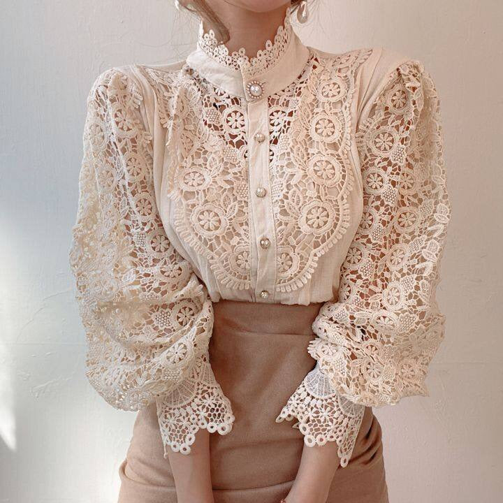 Elegant lace-embroidered tunic blouse