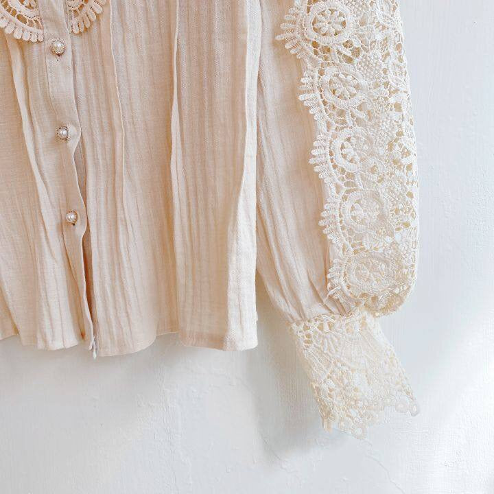 Elegant lace-embroidered tunic blouse