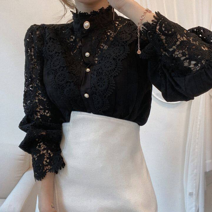 Elegant lace-embroidered tunic blouse