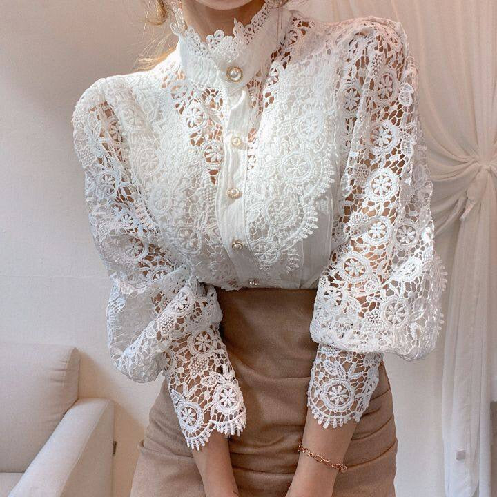 Elegant lace-embroidered tunic blouse