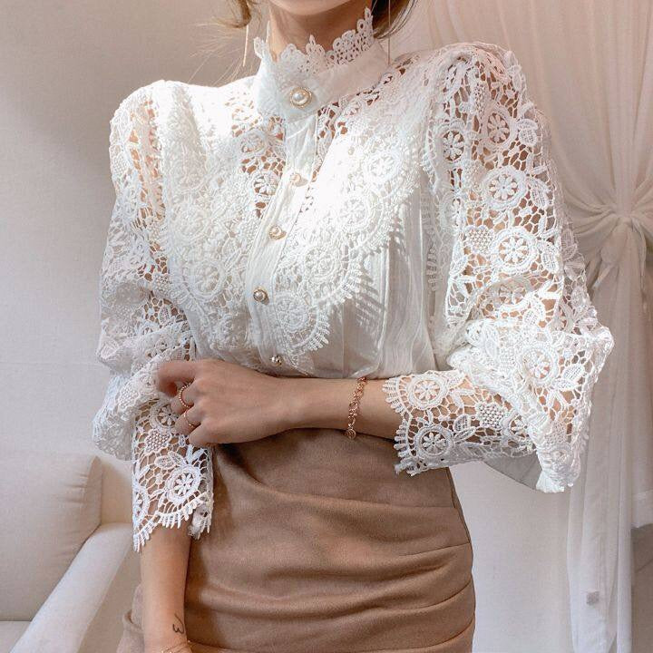 Elegant lace-embroidered tunic blouse