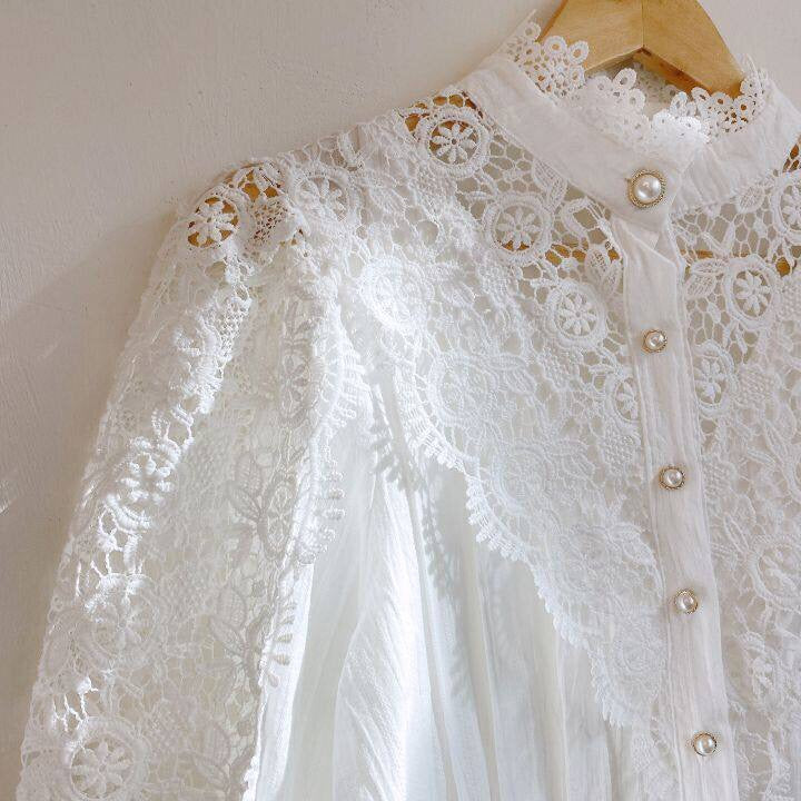 Elegant lace-embroidered tunic blouse