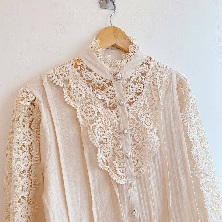 Elegant lace-embroidered tunic blouse