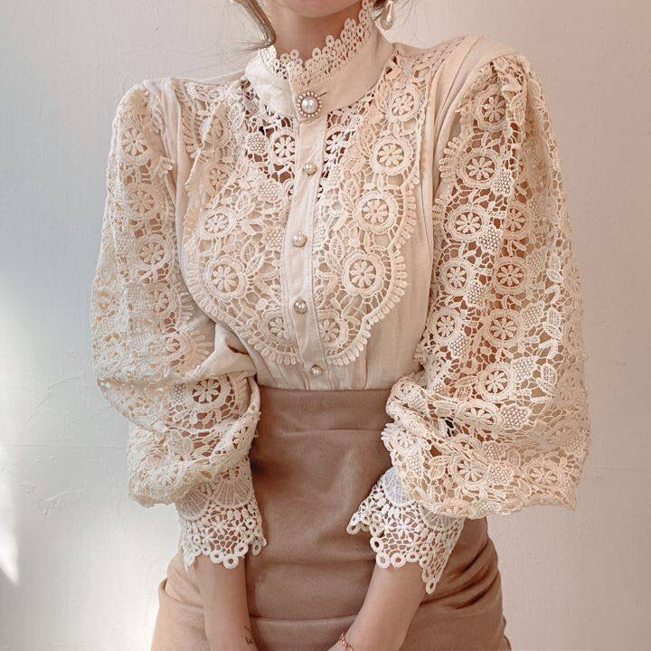 Elegant lace-embroidered tunic blouse