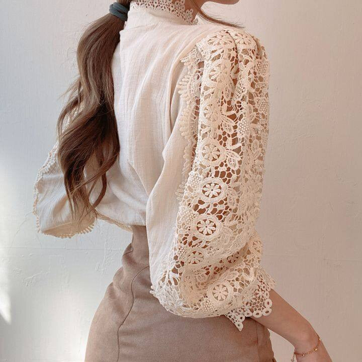 Elegant lace-embroidered tunic blouse