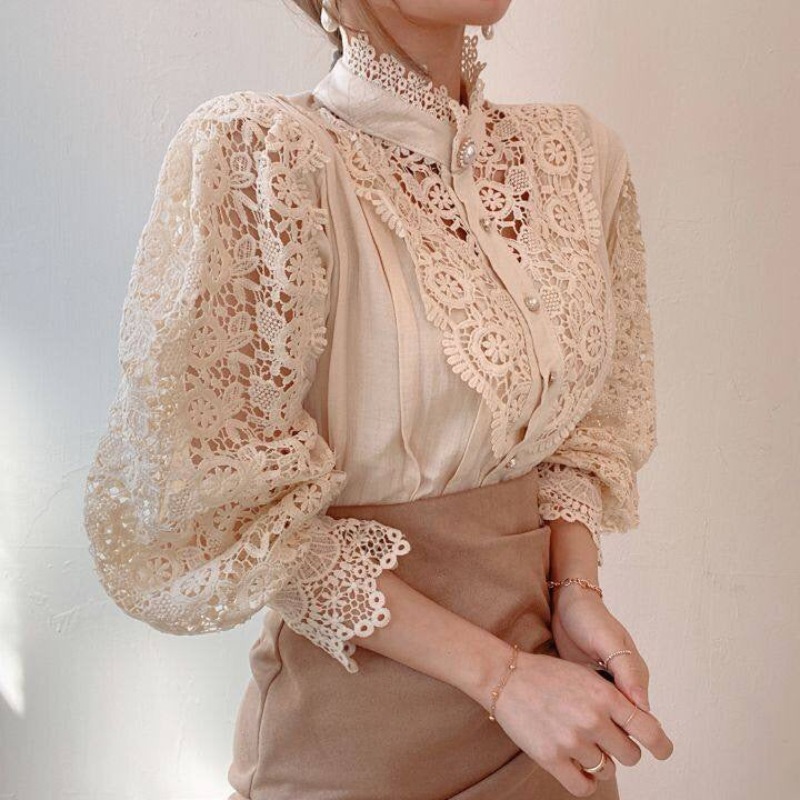 Elegant lace-embroidered tunic blouse