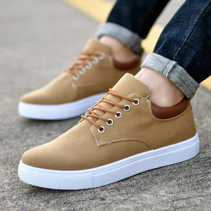 Casual men's sneakers with white sole