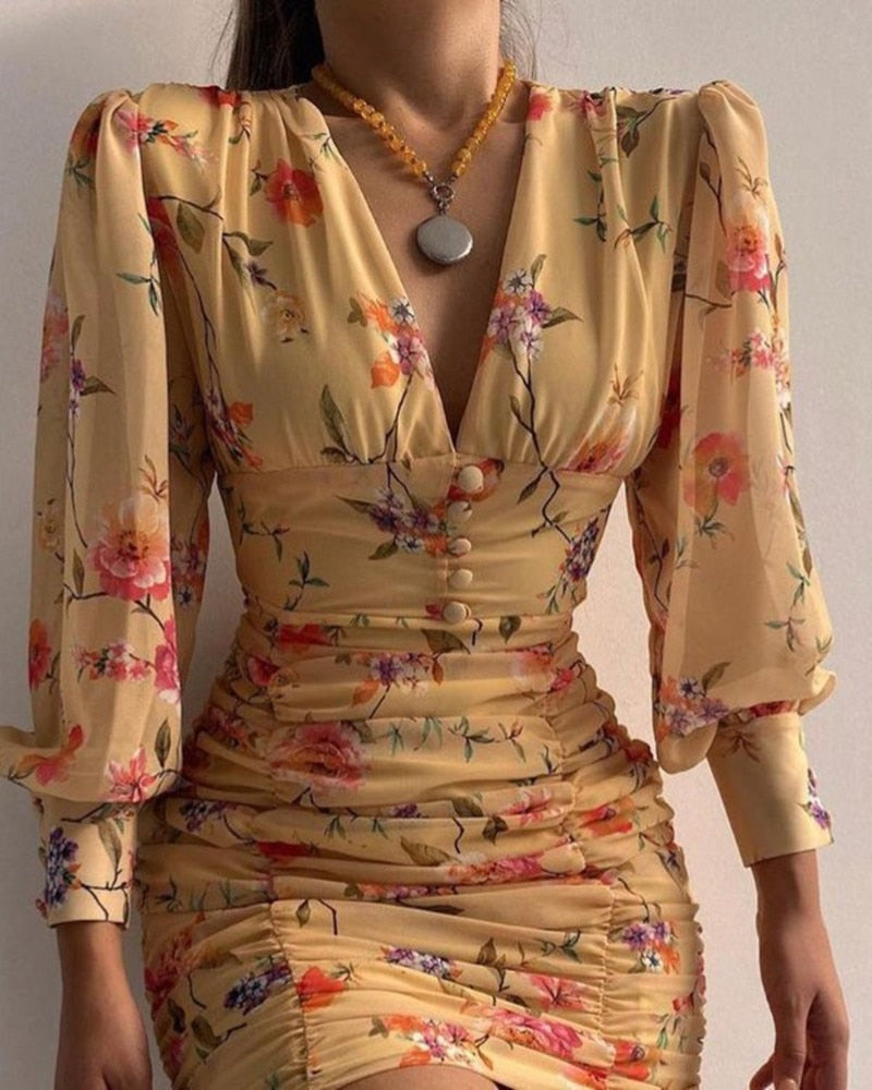 Printed dress with low V-neck