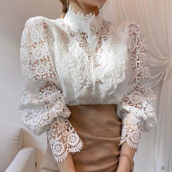 Elegant lace-embroidered tunic blouse