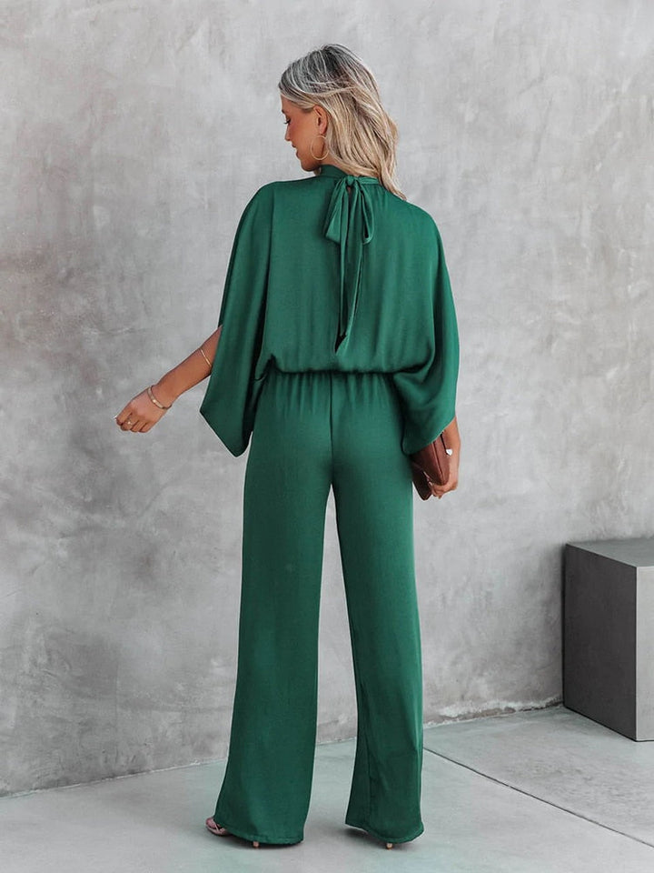 Green elegant jumpsuit with high neck