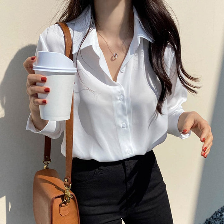 Classic button-down blouse with relaxed fit