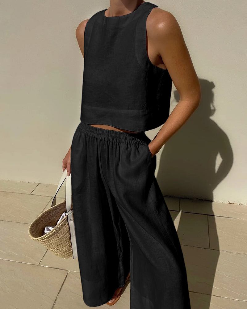 Sleeveless crop top and wide-leg trousers