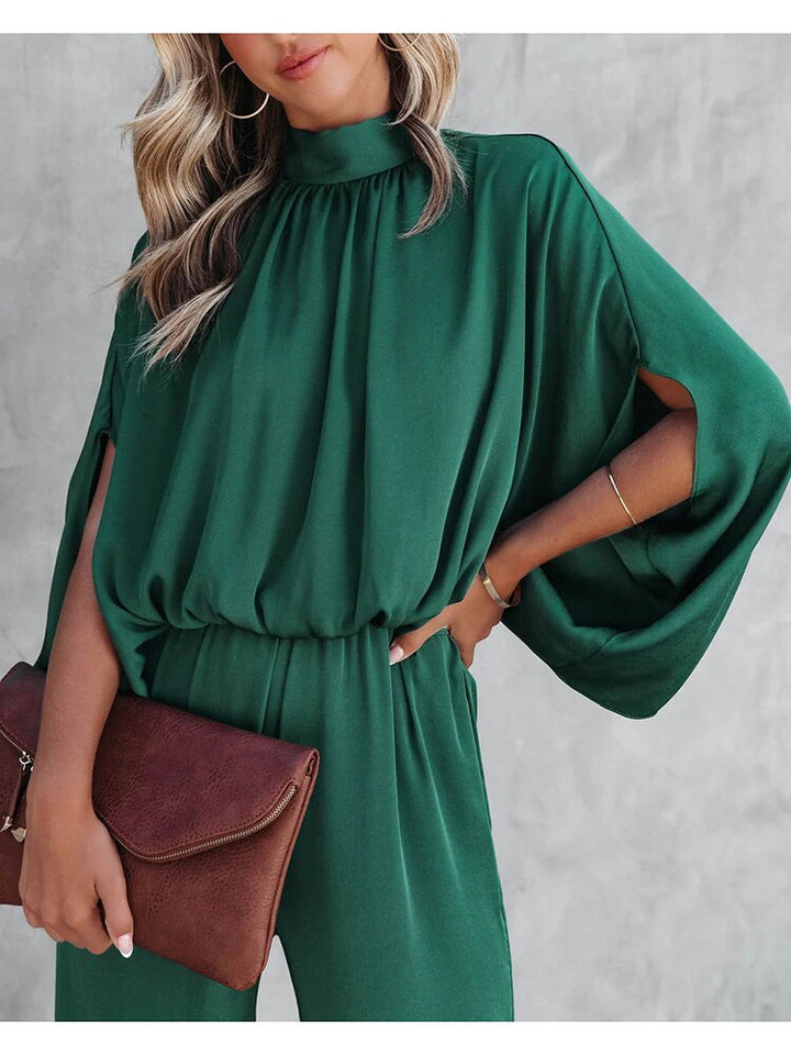 Green elegant jumpsuit with high neck