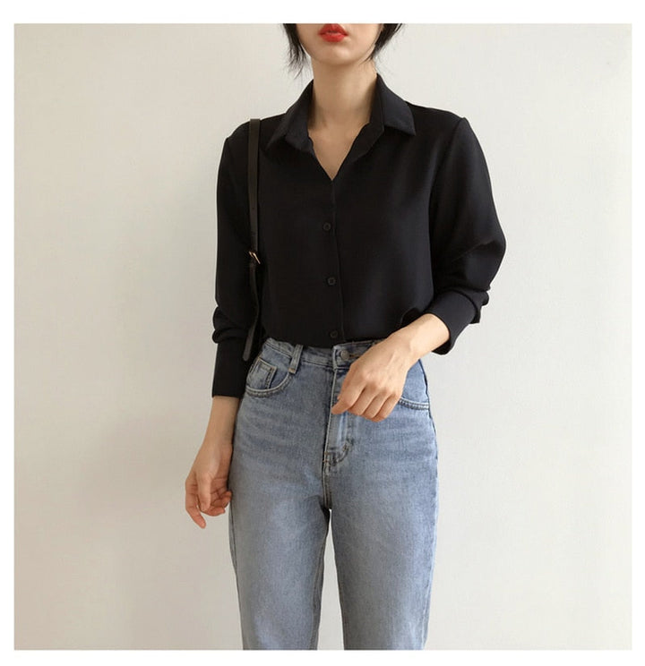 Classic button-down blouse with relaxed fit