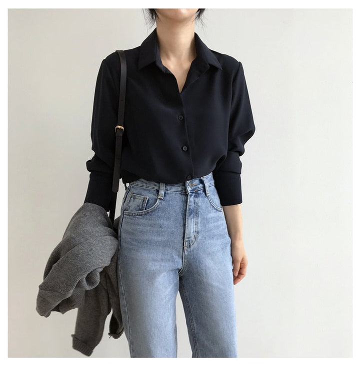 Classic button-down blouse with relaxed fit