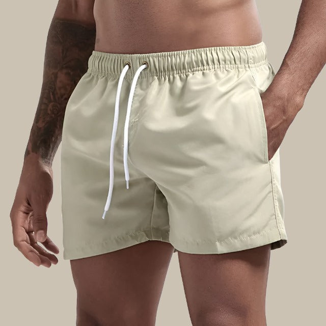 Quick-dry swim shorts with elasticated drawstring waist