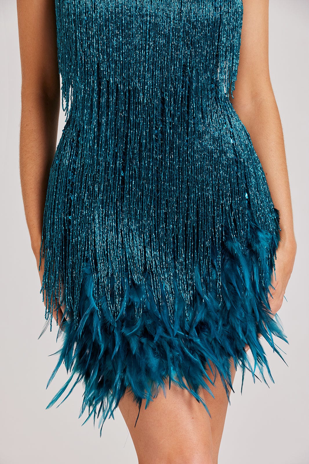 Sleeveless mini glitter dress with sequins and fringe