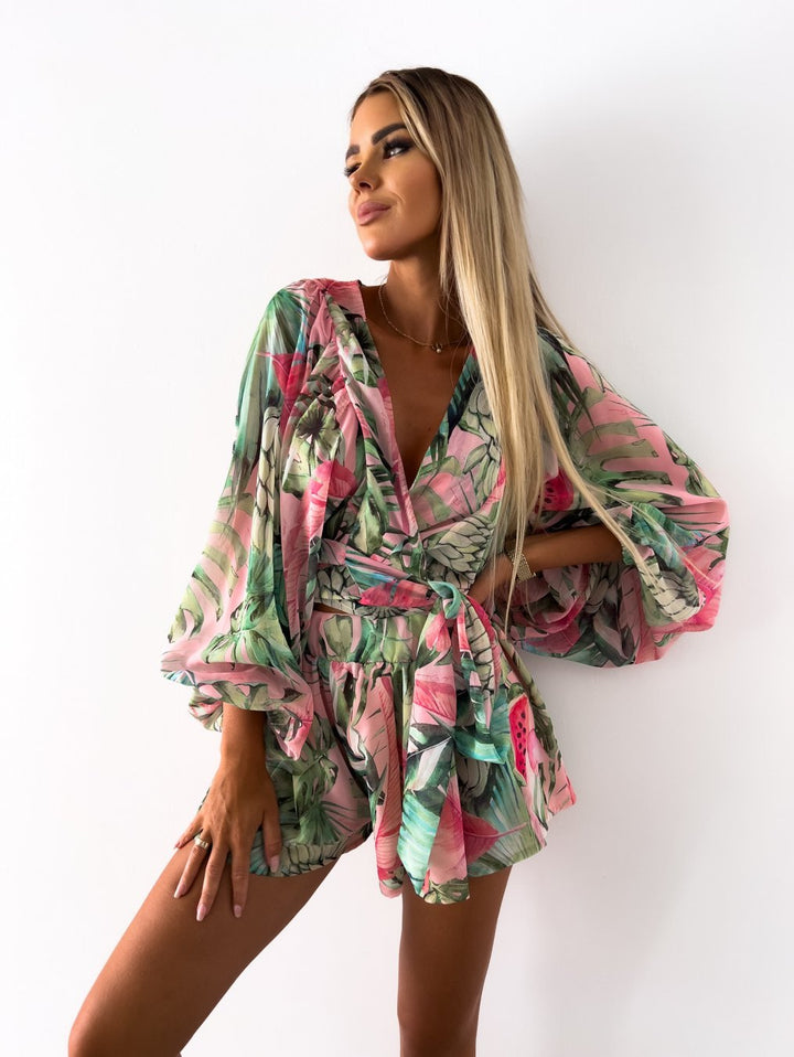 Tropical print playsuit with deep v-neck and wide sleeves