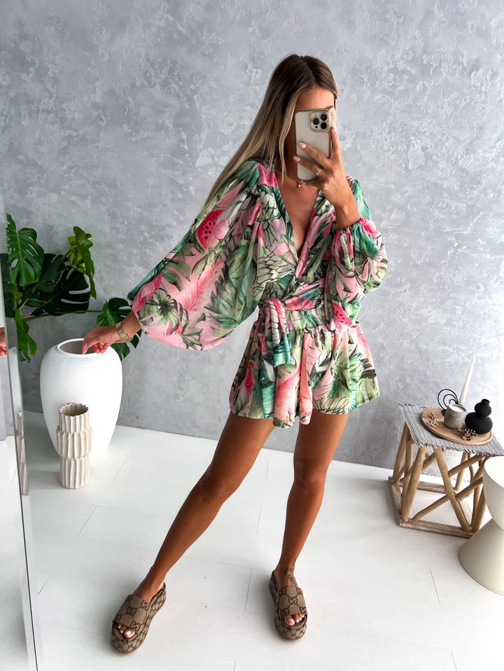 Tropical print playsuit with deep v-neck and wide sleeves