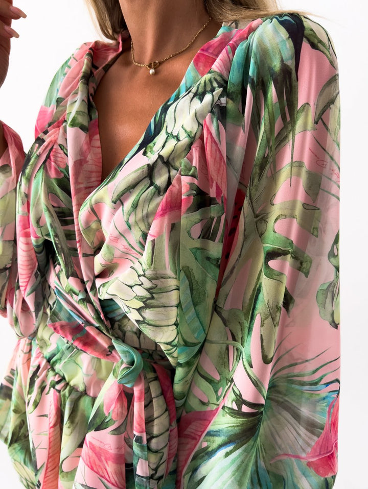 Tropical print playsuit with deep v-neck and wide sleeves