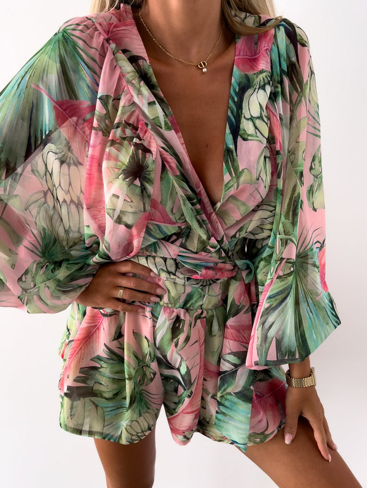 Tropical print playsuit with deep v-neck and wide sleeves