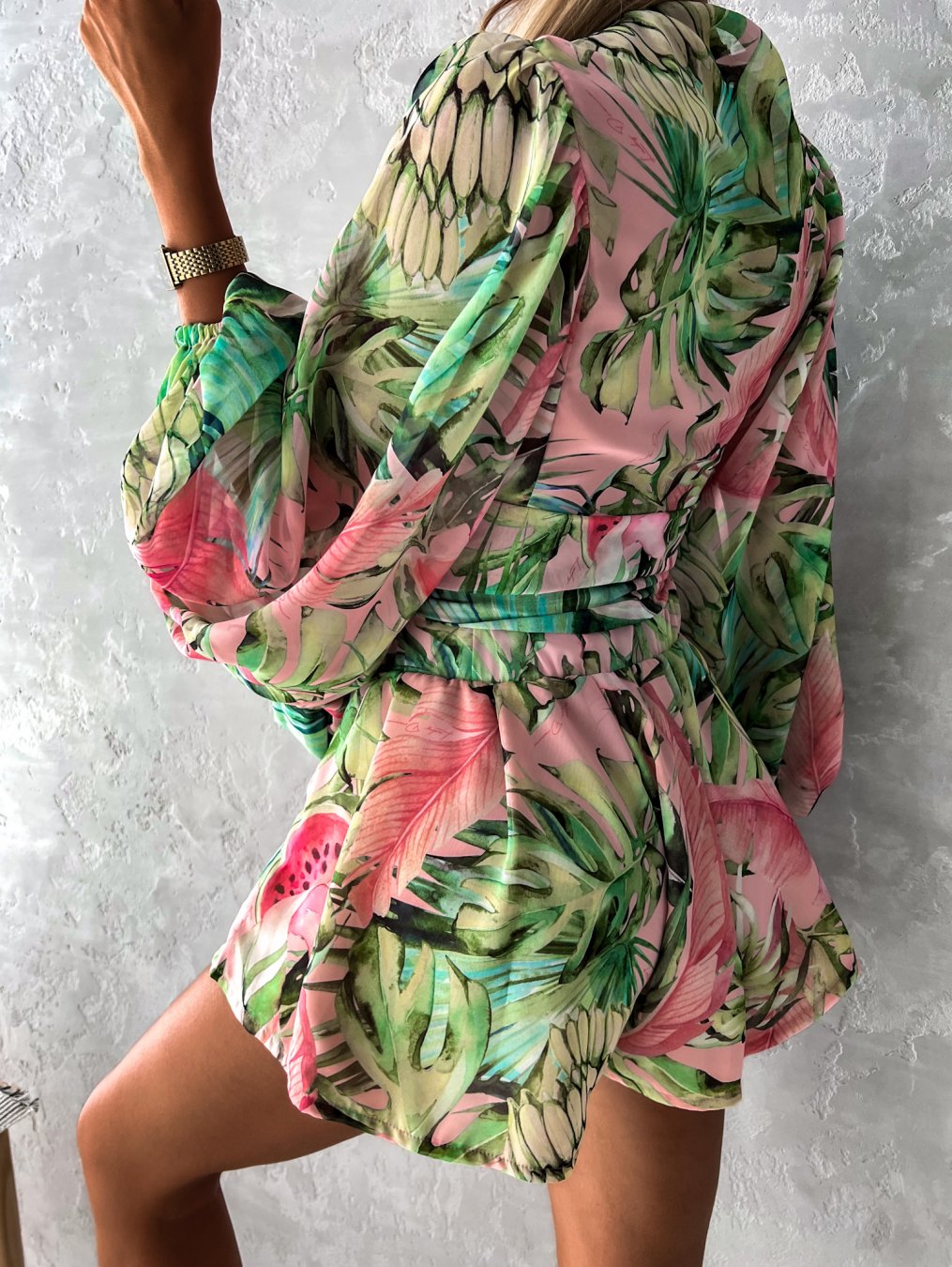 Tropical print playsuit with deep v-neck and wide sleeves