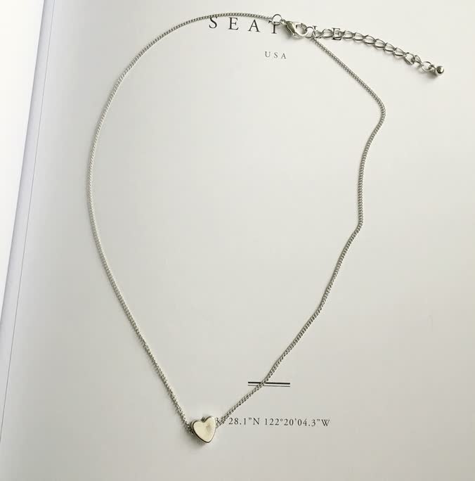 Necklace with charming heart pendant