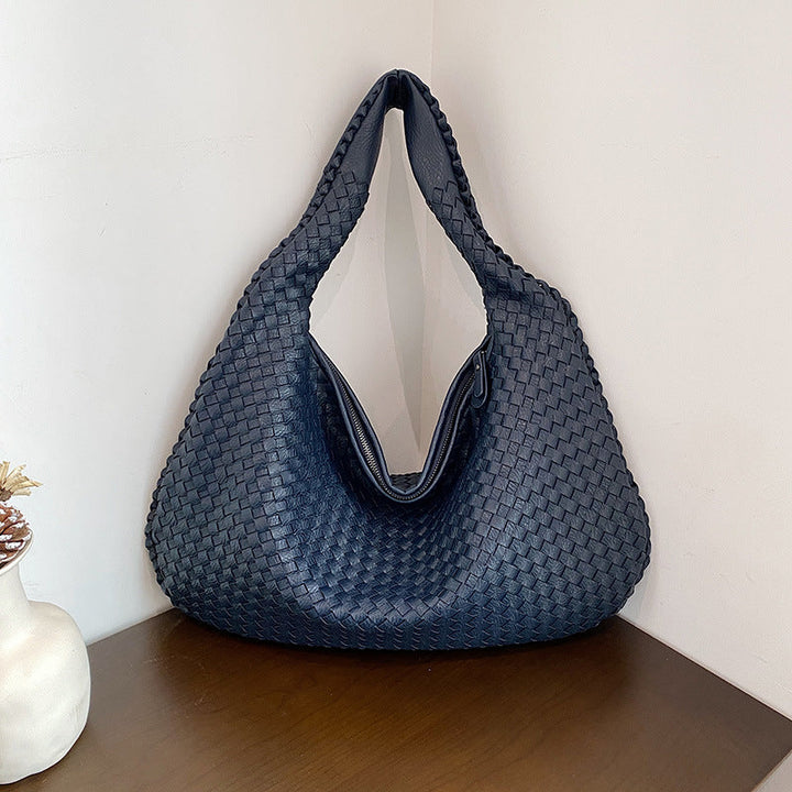 Shoulder bag with stylish woven design