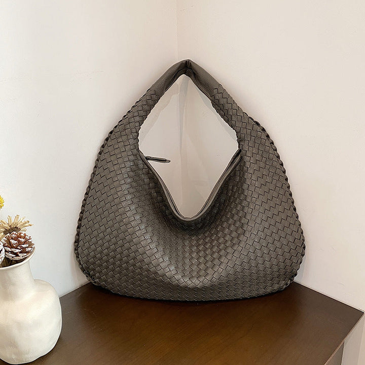 Shoulder bag with stylish woven design