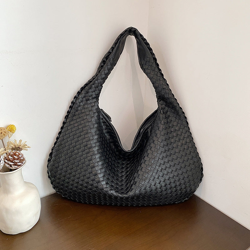 Shoulder bag with stylish woven design